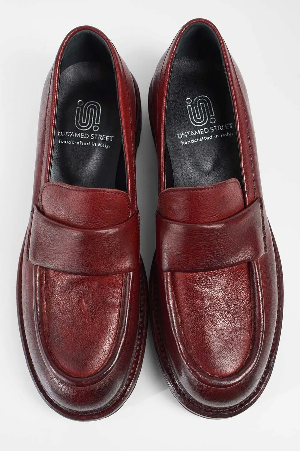 CAMDEN red-berry slip on shoes.